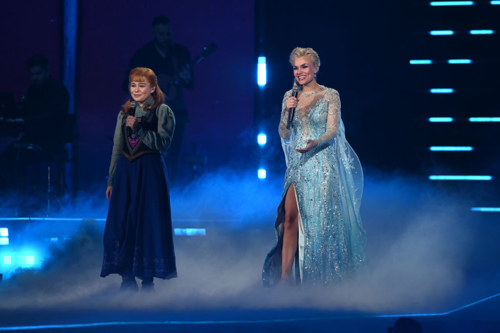 ana and elsa on stage in frozen musical