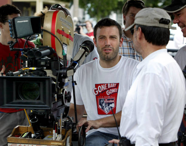 Ben Affleck behind a camera on the set of Gone Baby Gone