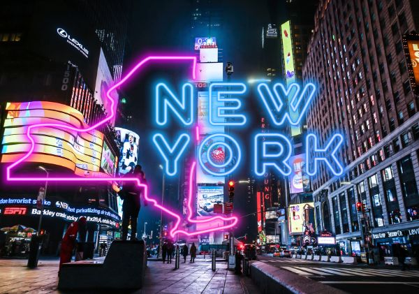 New York background with pink and blue neon New York sign