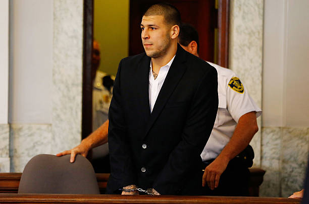 Aaron Hernandez in court wearing handcuffs