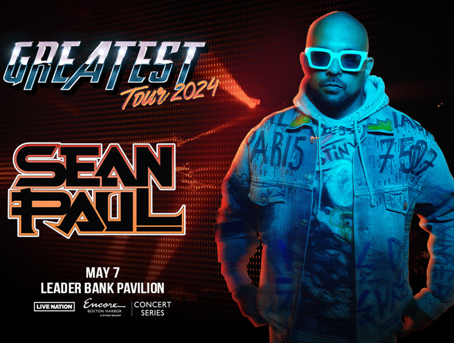 Sean Paul Greatest Tour 2024 Artwork. Sean Paul in jean jacket and sun glasses in blue light with a red/orange stage background